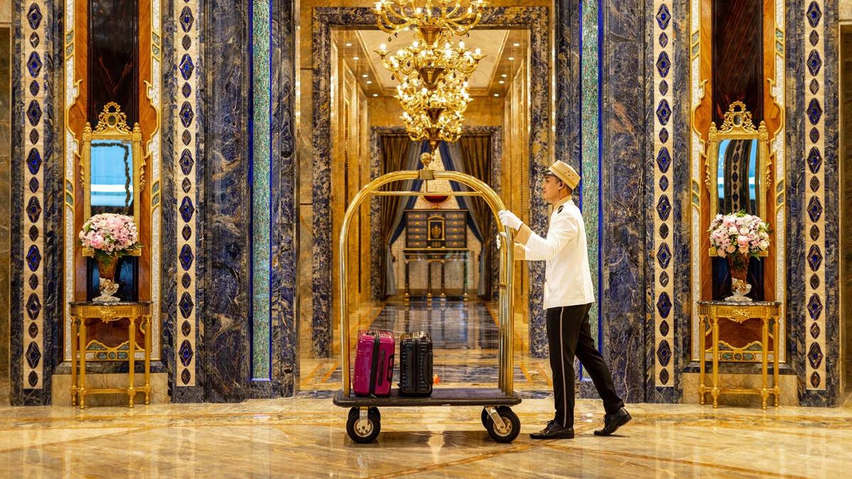 Opulent and grand hotel suite interior at The Reverie Saigon in Ho Chi Minh City